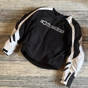 Motorcycle jacket with elbow and shoulder pads.